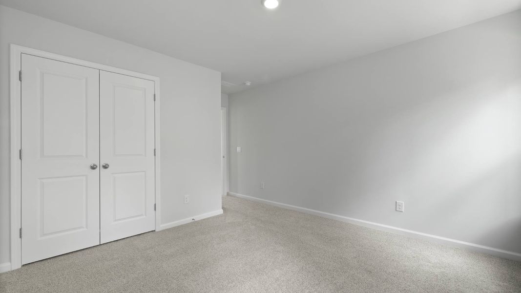 Representative unfurnished interior of a home built from the FORRESTER by D.R. Horton in Founders Corner, Summerville (Image 26).