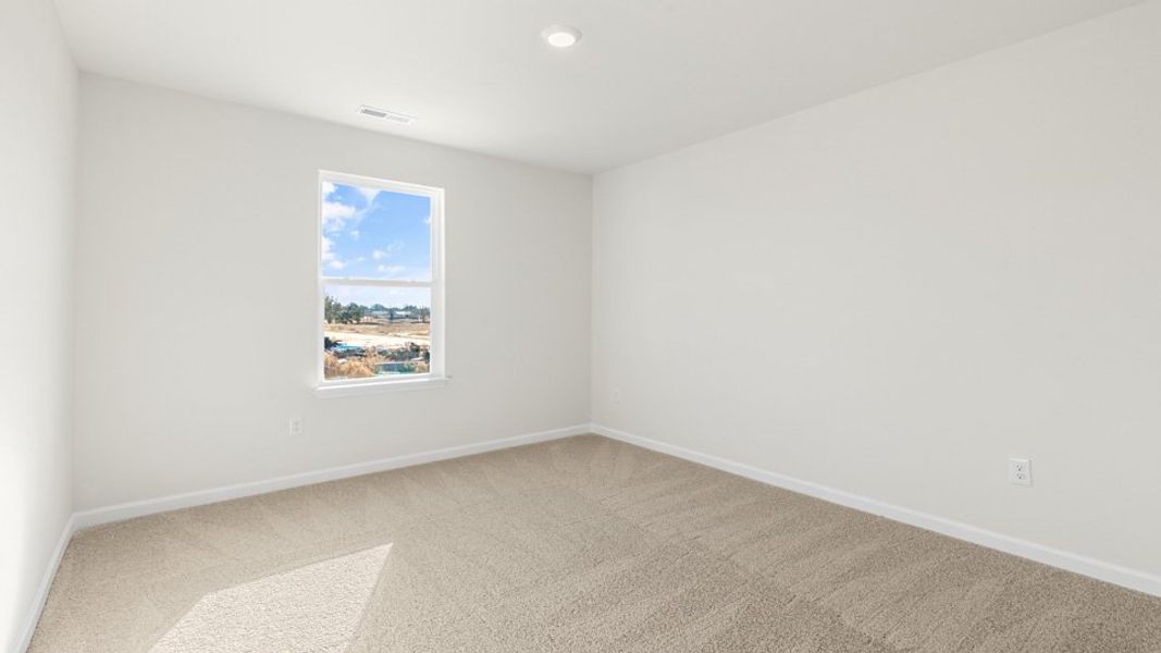 Spacious, unfurnished interior of a new home in The Townes at Honeycutt Oaks, Angier (Image 13).