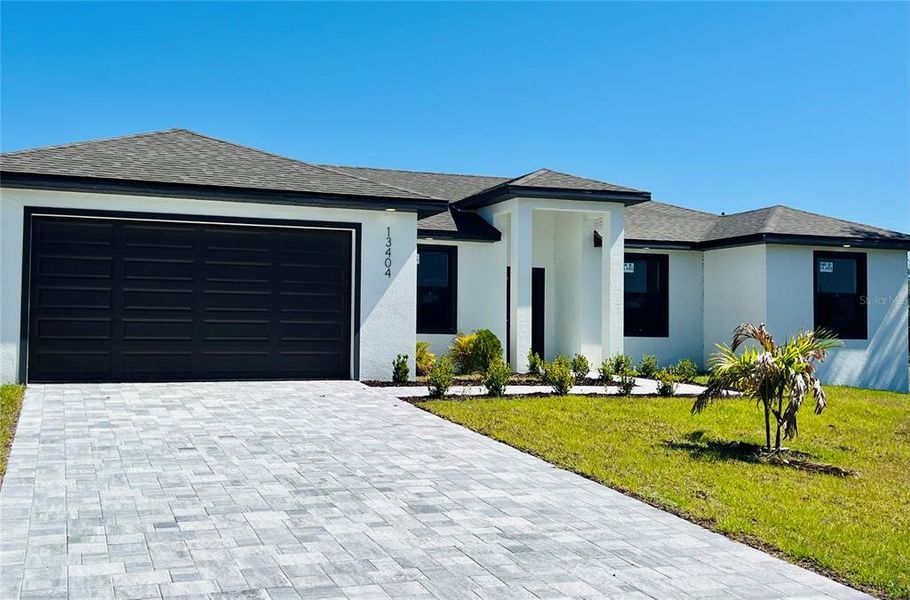 Front exterior of a new home in , Port Charlotte, FL, highlighting curb appeal (Image 31).