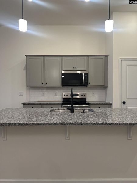 Furnished interior view inside a new home in Piney Woods Bluff, Columbia (Image 6).