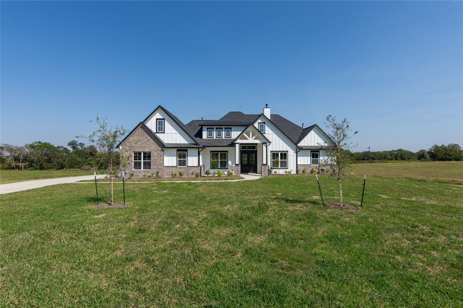 Front exterior of a new home in , Chappell Hill, TX, highlighting curb appeal (Image 29).