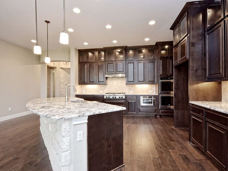 Representative furnished interior of a home built from the Madera II by Giddens Homes in Scofield Farms Estates, Georgetown (Image 213).