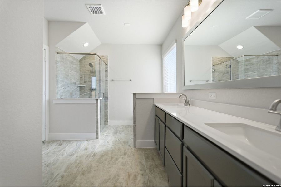 Furnished interior view inside a new home in The Woodlands at Medina Hills, Mico (Image 15).