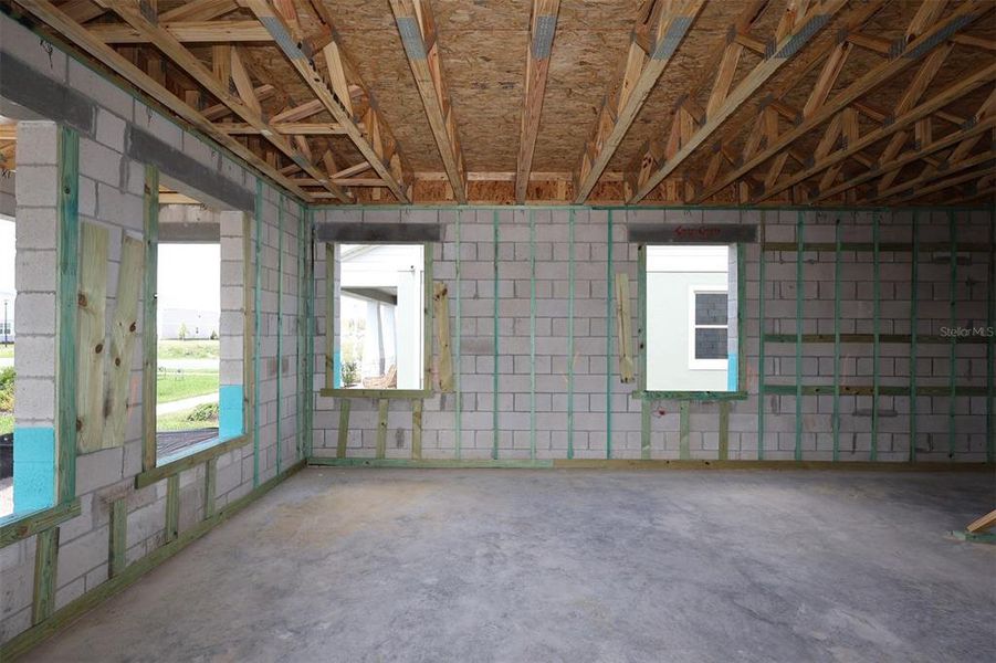 In-progress construction of a new home in Center Lake on the Park, St. Cloud, FL (Image 13).