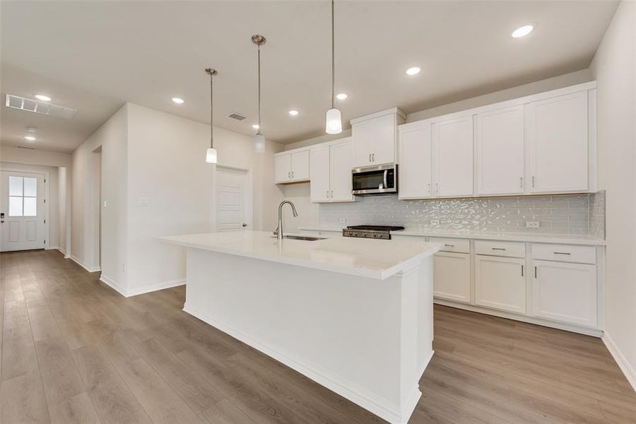 Furnished interior view inside a new home in Spiritas Ranch, Little Elm (Image 7). Furnished interior view inside a new home in Spiritas Ranch, Little Elm (Image 7).