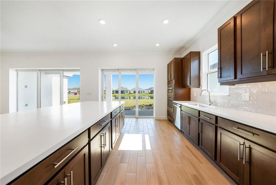 Furnished interior view inside a new home in Esplanade at Skye Ranch, Sarasota (Image 9).