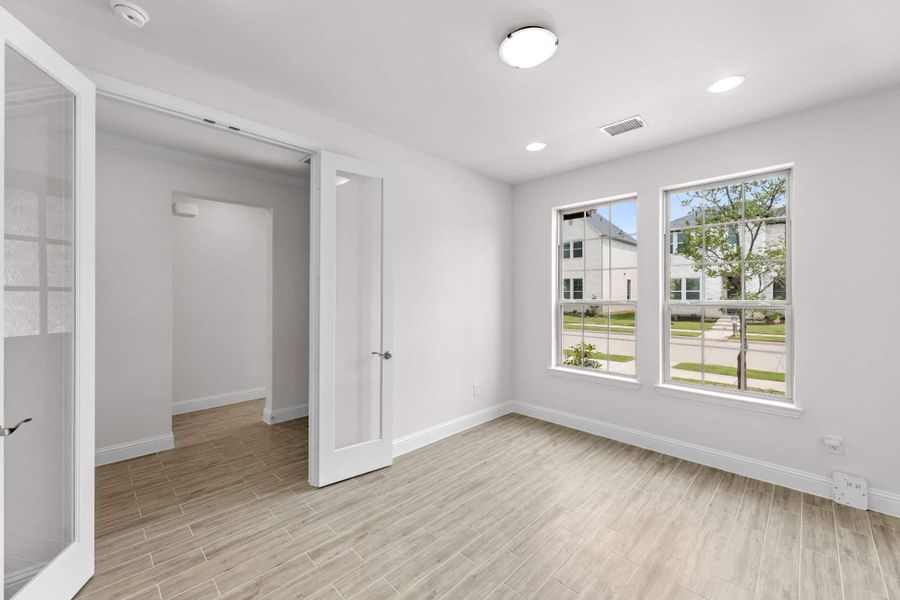 Representative unfurnished interior of a home built from the Willow by UnionMain Homes in Edgewater, Fate (Image 12).