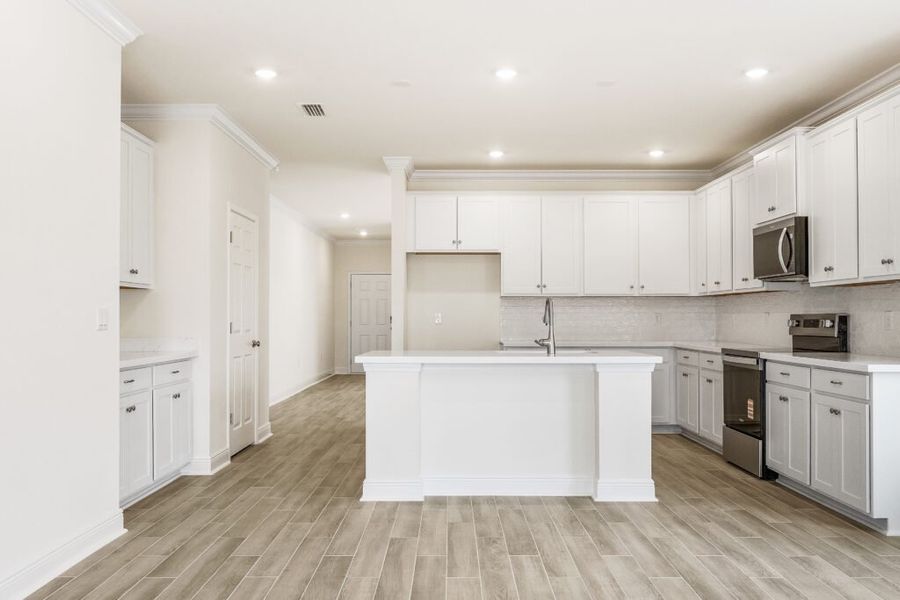 Furnished interior view inside a new home in Natureview, Freeport (Image 12).