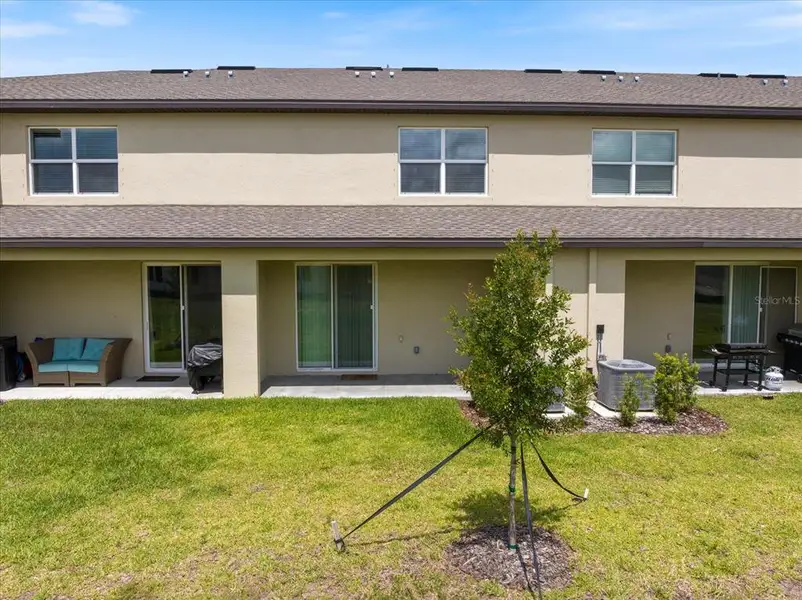 Exterior details and patio area of a home in , Palmetto (Image 3).