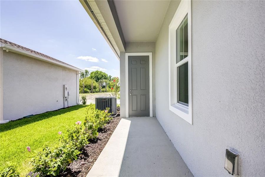 Exterior details and patio area of a home in Bungalow Walk at Lakewood Ranch, Sarasota (Image 21).