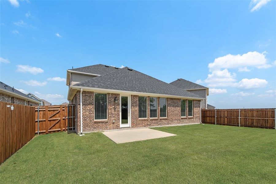 Front exterior of a new home in Walden Pond, Forney, TX, highlighting curb appeal (Image 1). Front exterior of a new home in Walden Pond, Forney, TX, highlighting curb appeal (Image 1).