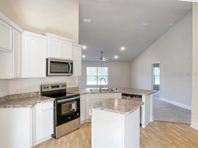 Furnished interior view inside a new home in Poinciana - Polk County, Poinciana (Image 3).