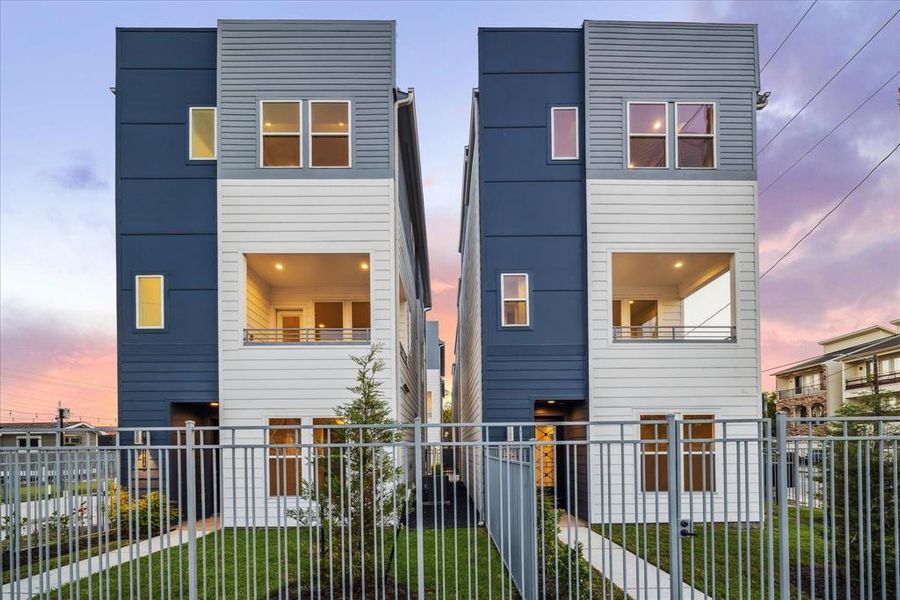 Contemporary single-family homes with sleek, modern architecture featuring clean lines and a two-tone façade. These homes boast spacious open balconies, large windows for ample natural light, and private gated entry.