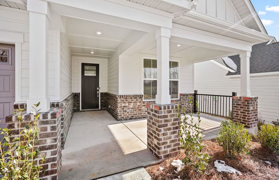 Exterior details and patio area of a home in Carolina Riverside, Belmont (Image 3).