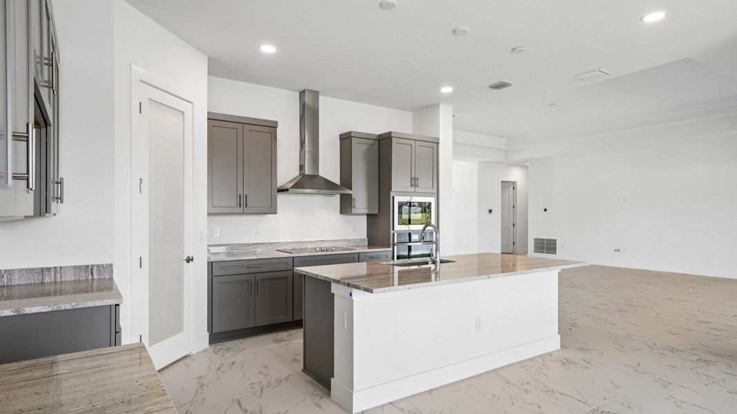 Furnished interior view inside a new home in Biscayne Landing at Seaire, Parrish (Image 12).