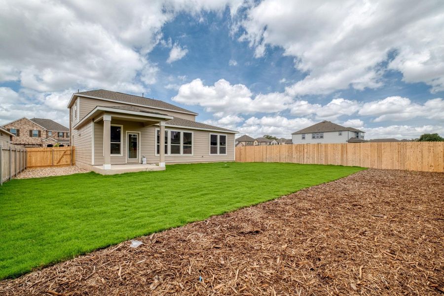 Front exterior of a new home in River Bluff, Leander, TX, highlighting curb appeal (Image 2). Front exterior of a new home in River Bluff, Leander, TX, highlighting curb appeal (Image 2).