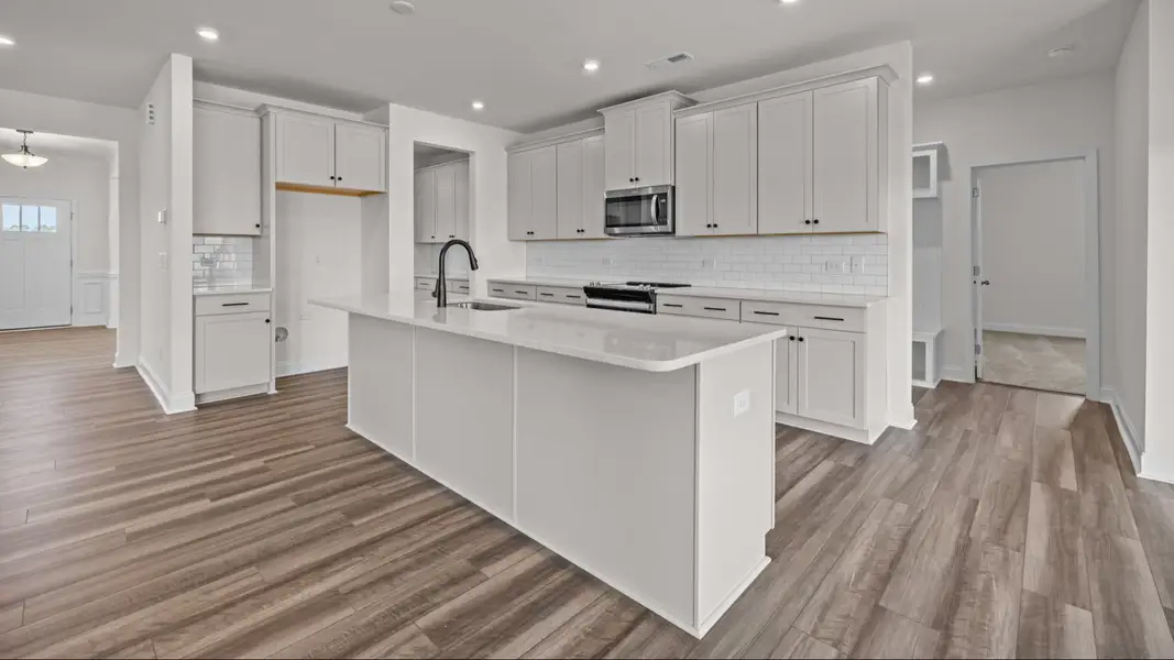 The Norris Plan by DRB Homes in Michaux Gardens - Kitchen (Representative Photo) The Norris Plan by DRB Homes in Michaux Gardens - Kitchen (Representative Photo)