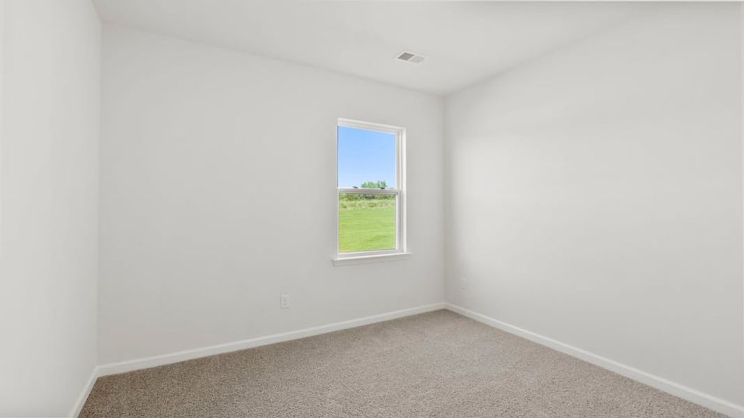 Spacious, unfurnished interior of a new home in Durbin Meadows Traditions, Fountain Inn (Image 23).