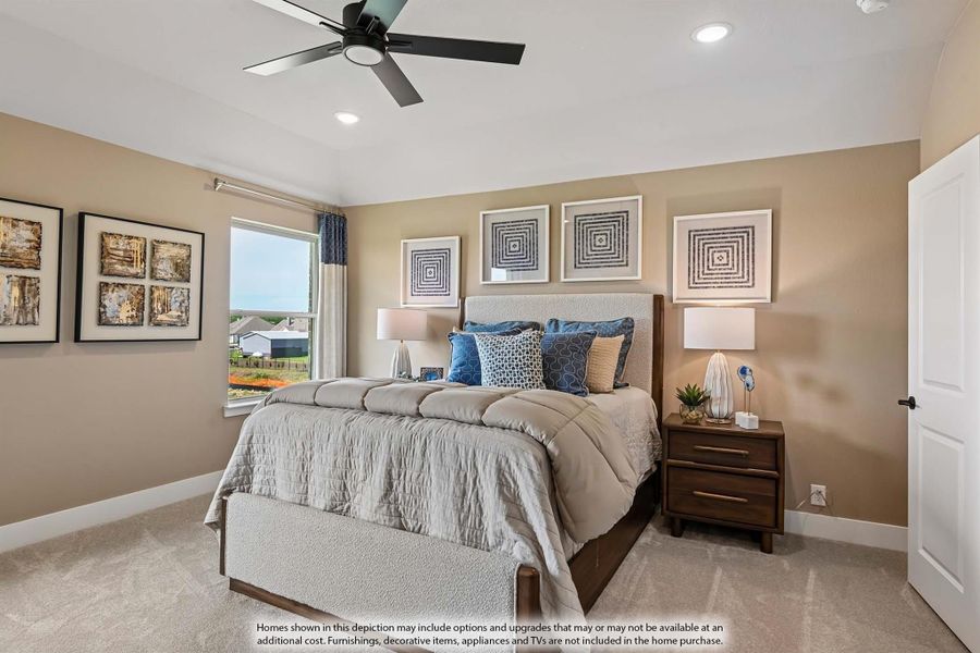 Bedroom with upholstered bed, ceiling fan, carpet flooring, and large window with natural light Bedroom with upholstered bed, ceiling fan, carpet flooring, and large window with natural light