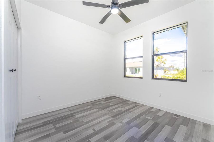Spacious, unfurnished interior of a new home in , Port Charlotte (Image 49).