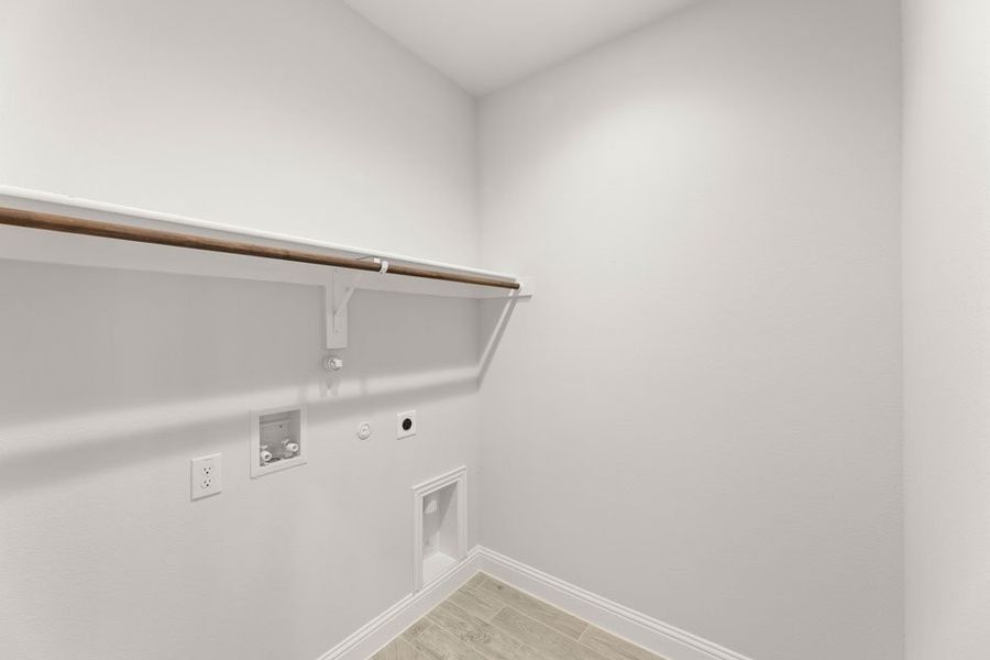 Representative exterior photo of a completed home built from the Winchester by Impression Homes in Timberbrook, Justin, TX (Image 23).