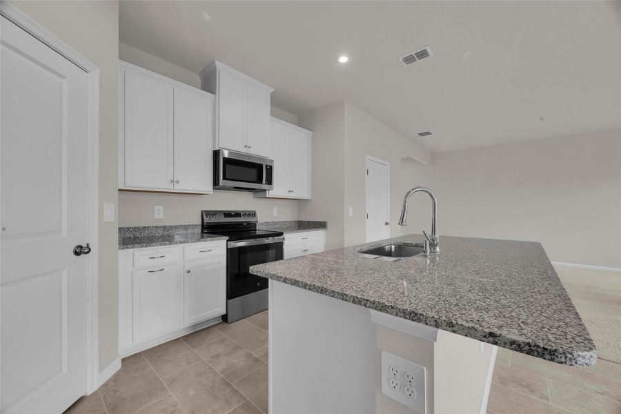 Furnished interior view inside a new home in Central Park, Port St. Lucie (Image 4).
