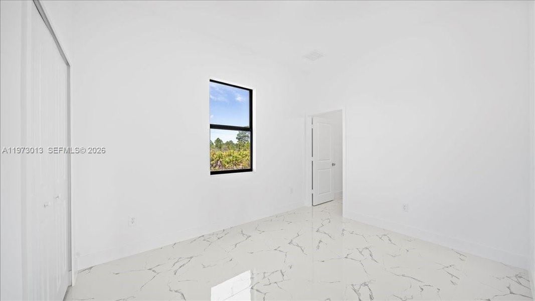 Spacious, unfurnished interior of a new home in , Lehigh Acres (Image 15).