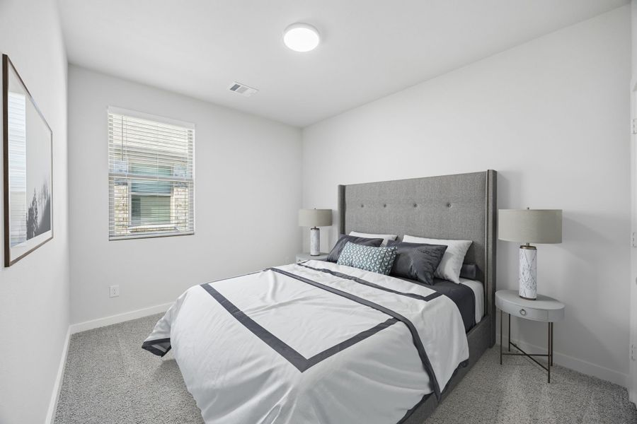 Bedroom in the Birch home plan by Trophy Signature Homes – REPRESENTATIVE PHOTO