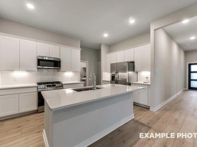 Furnished interior view inside a new home in Sunterra, Katy (Image 3).