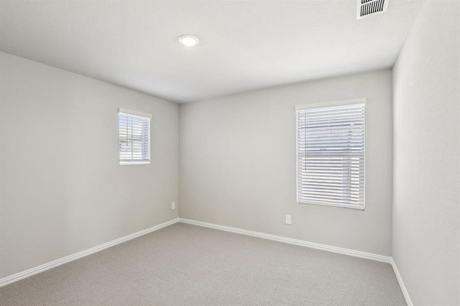 Spacious, unfurnished interior of a new home in Simpson Crossing - Spring Series, McKinney (Image 20).