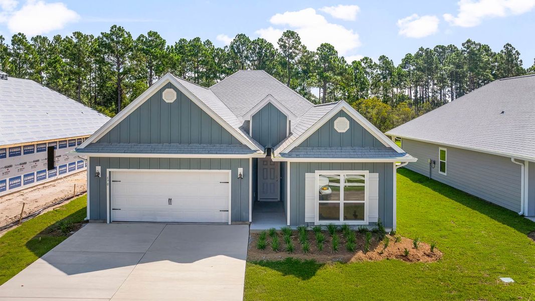 Representative exterior photo of a completed home built from the The Kennedy by D.R. Horton in Buffer Farms, Port Saint Joe, FL (Image 1).