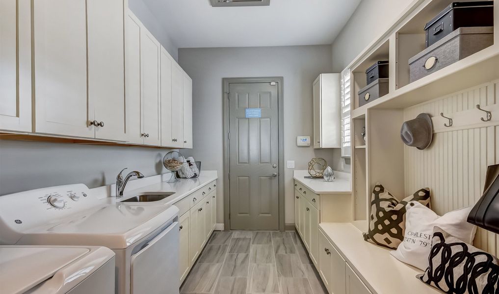 Laundry room with cabinets