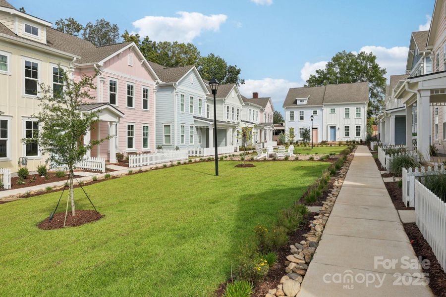 Exterior details and patio area of a home in Walk23, Huntersville (Image 22).