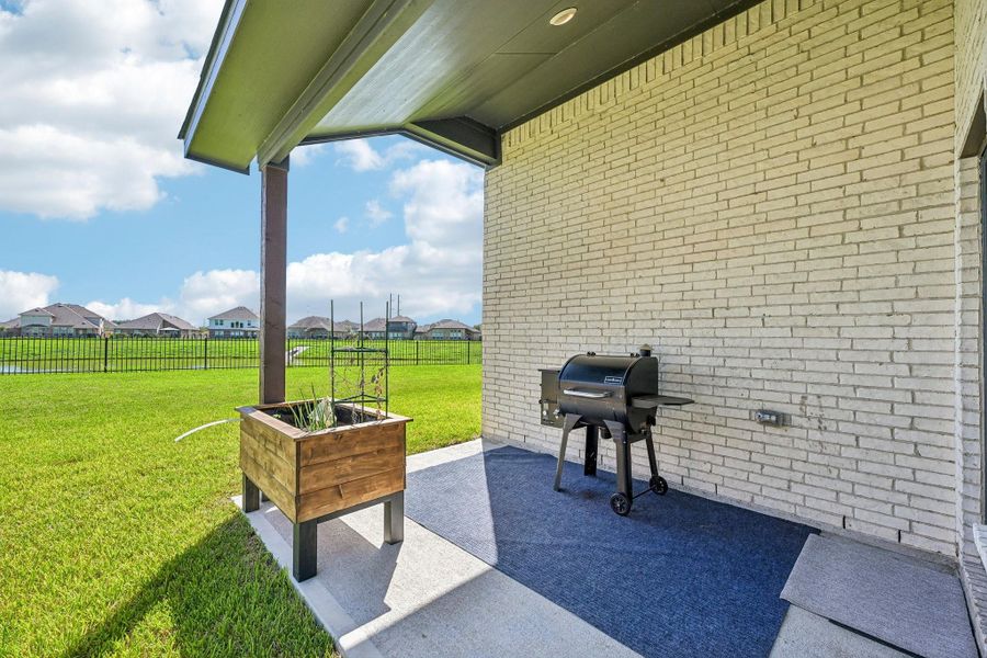 Exterior details and patio area of a home in , Alvin (Image 25). Exterior details and patio area of a home in , Alvin (Image 25).