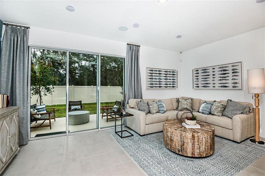 Furnished interior view inside a new home in The Townhomes at Anthem Park, St. Cloud (Image 9).