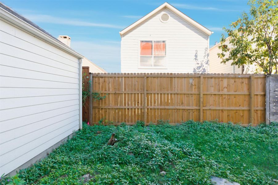 Exterior details and patio area of a home in , Houston (Image 3). Exterior details and patio area of a home in , Houston (Image 3).