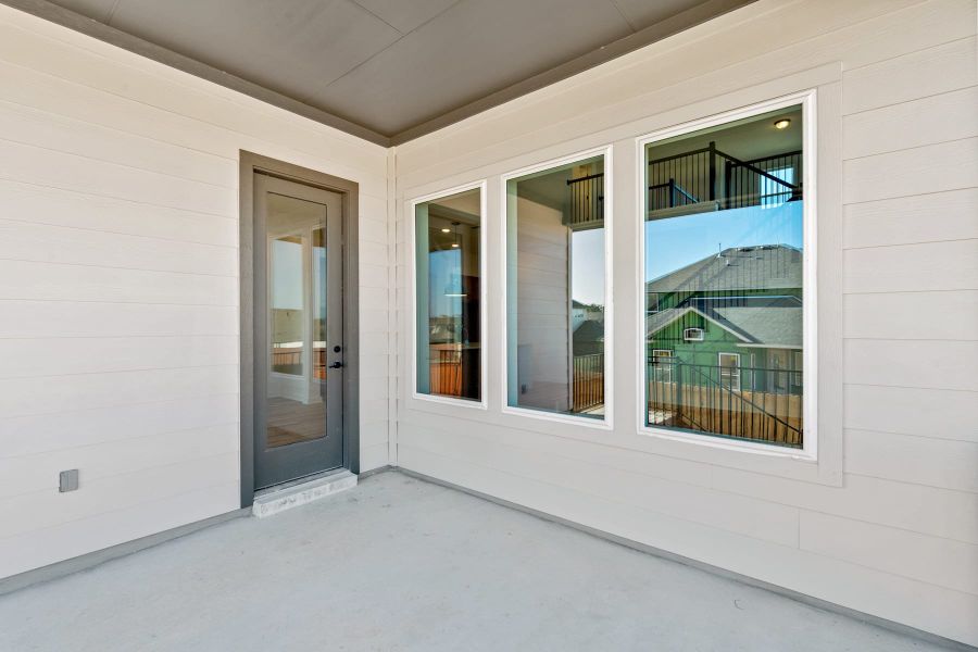 Exterior details and patio area of a home in Lariat, Liberty Hill (Image 22).