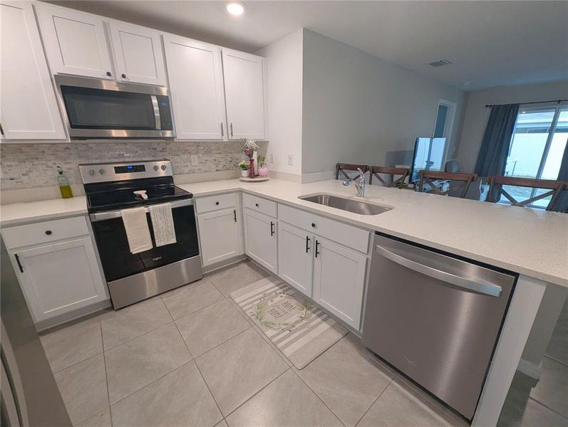 Furnished interior view inside a new home in , Zephyrhills (Image 6).