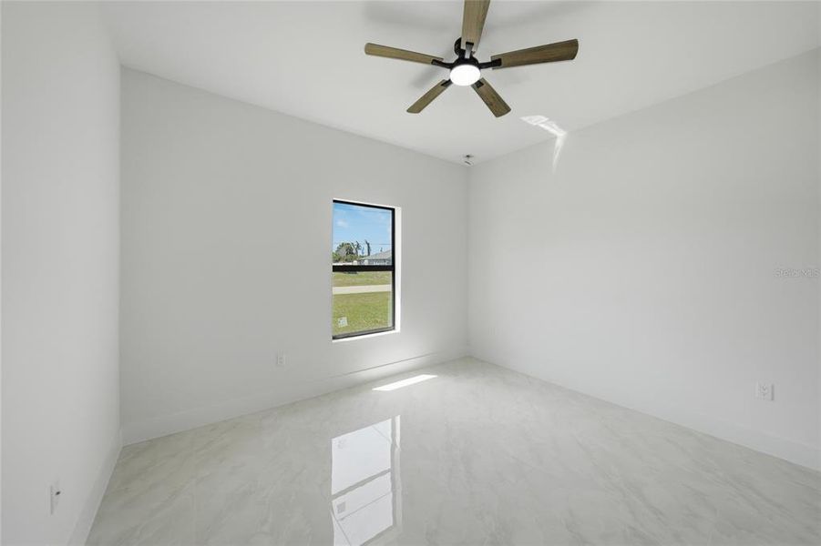 Spacious, unfurnished interior of a new home in , Port Charlotte (Image 39).