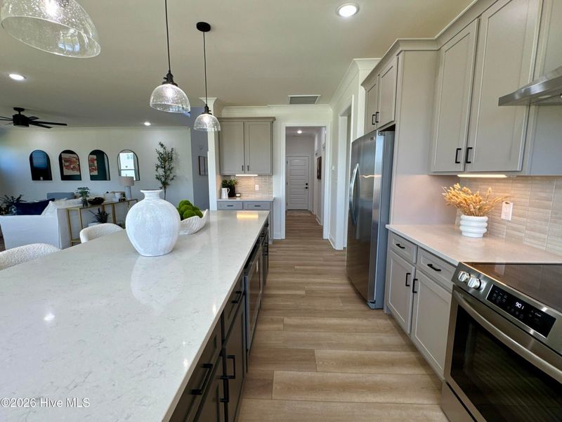 Furnished interior view inside a new home in Dixon Grove, Grimesland (Image 6).