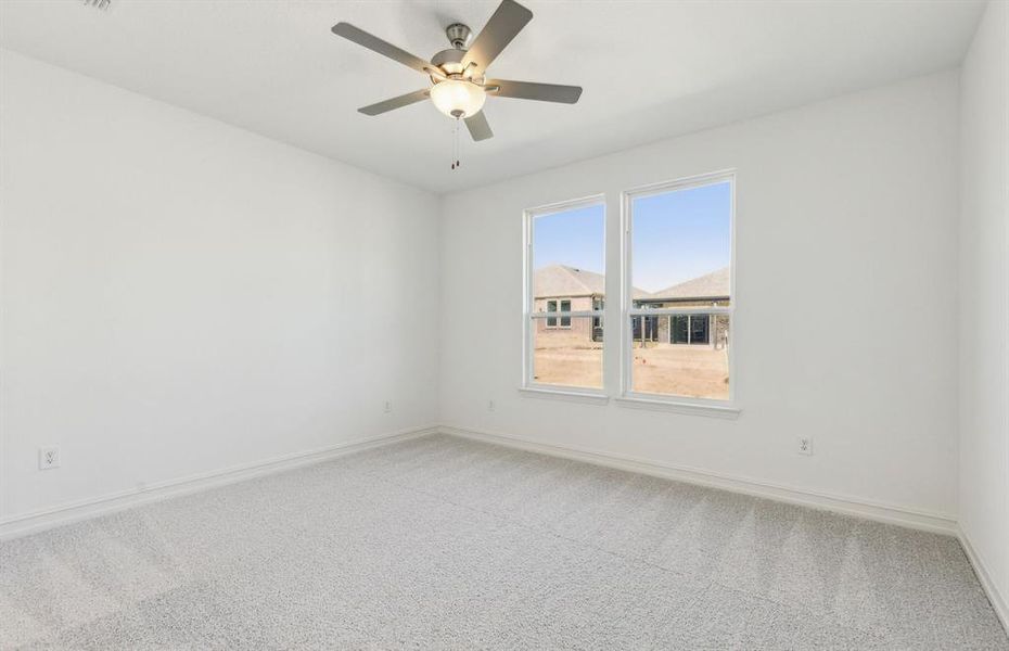 Elegant owner's suite with large windows *real home pictured Elegant owner's suite with large windows *real home pictured