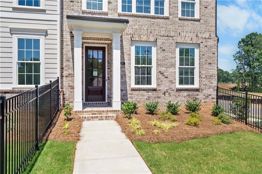 Exterior details and patio area of a home in Waterside Townhomes, Peachtree Corners (Image 3).