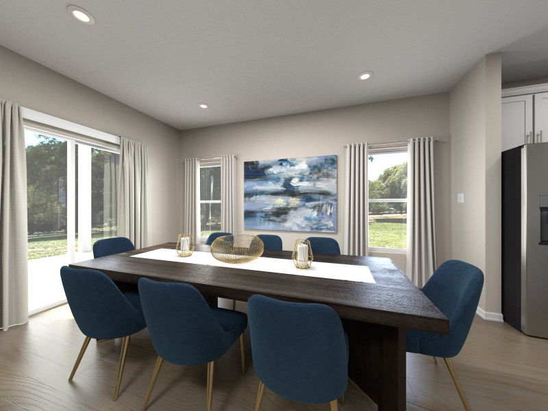 The dining room, located off the covered patio, is perfect for indoor/outdoor entertaining.