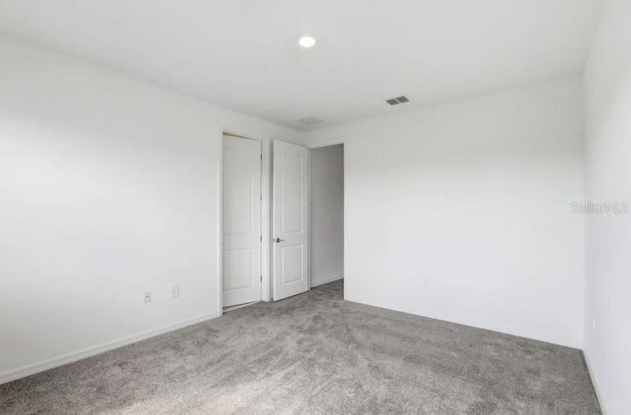 Spacious, unfurnished interior of a new home in Harvest at Ovation, Winter Garden (Image 22). Spacious, unfurnished interior of a new home in Harvest at Ovation, Winter Garden (Image 22).