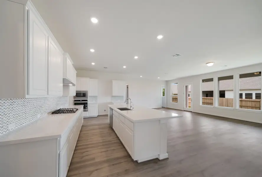 Representative furnished interior of a home built from the Englewood by Scott Felder Homes in Prominence, San Antonio (Image 3).