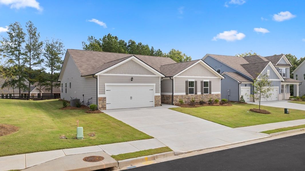 Representative exterior photo of a completed home built from the Denton by D.R. Horton in Fairway 17 at Mirror Lake, Villa Rica, GA (Image 2). Representative exterior photo of a completed home built from the Denton by D.R. Horton in Fairway 17 at Mirror Lake, Villa Rica, GA (Image 2).