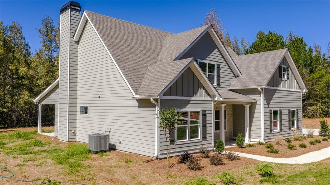 Front exterior of a new home in Collier Grove, Thomaston, GA, highlighting curb appeal (Image 21).