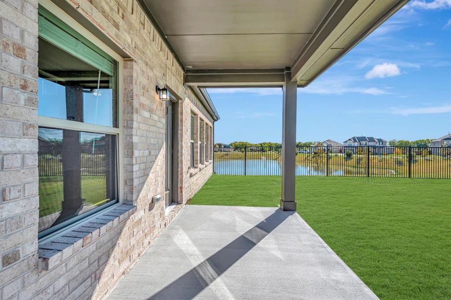Exterior details and patio area of a home in The Preserve, Justin (Image 2).