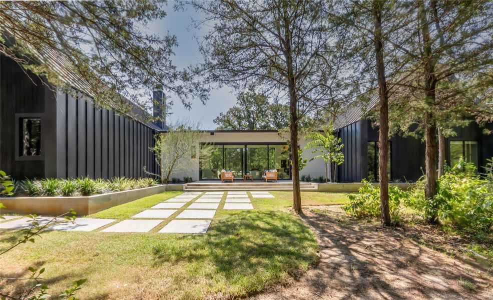 Front exterior of a new home in , College Station, TX, highlighting curb appeal (Image 24).