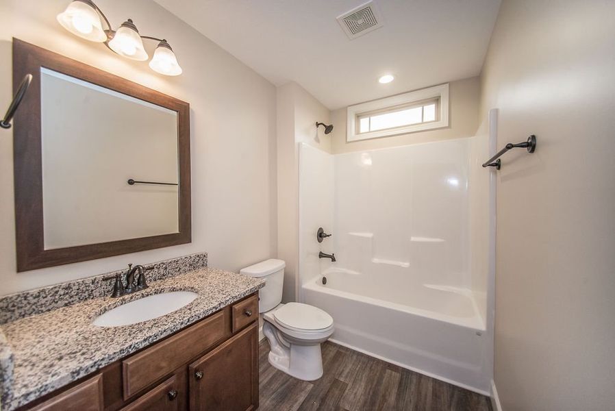 Representative furnished interior of a home built from the Inman by Enchanted Homes in Hampshire Heights, Moore (Image 6).